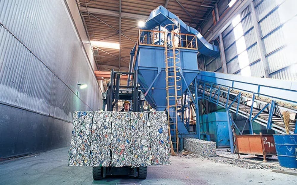 Industrial Scrap Metal Baler in Operation