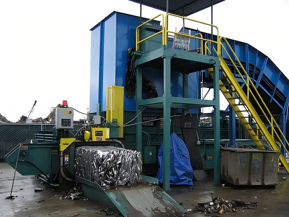 Industrial Scrap Metal Baler in a Foundry Environment