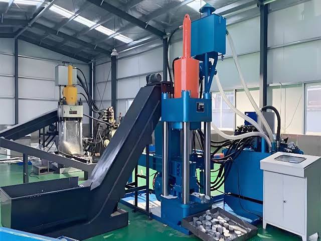 Industrial Metal Briquetting Machine in Factory Setting