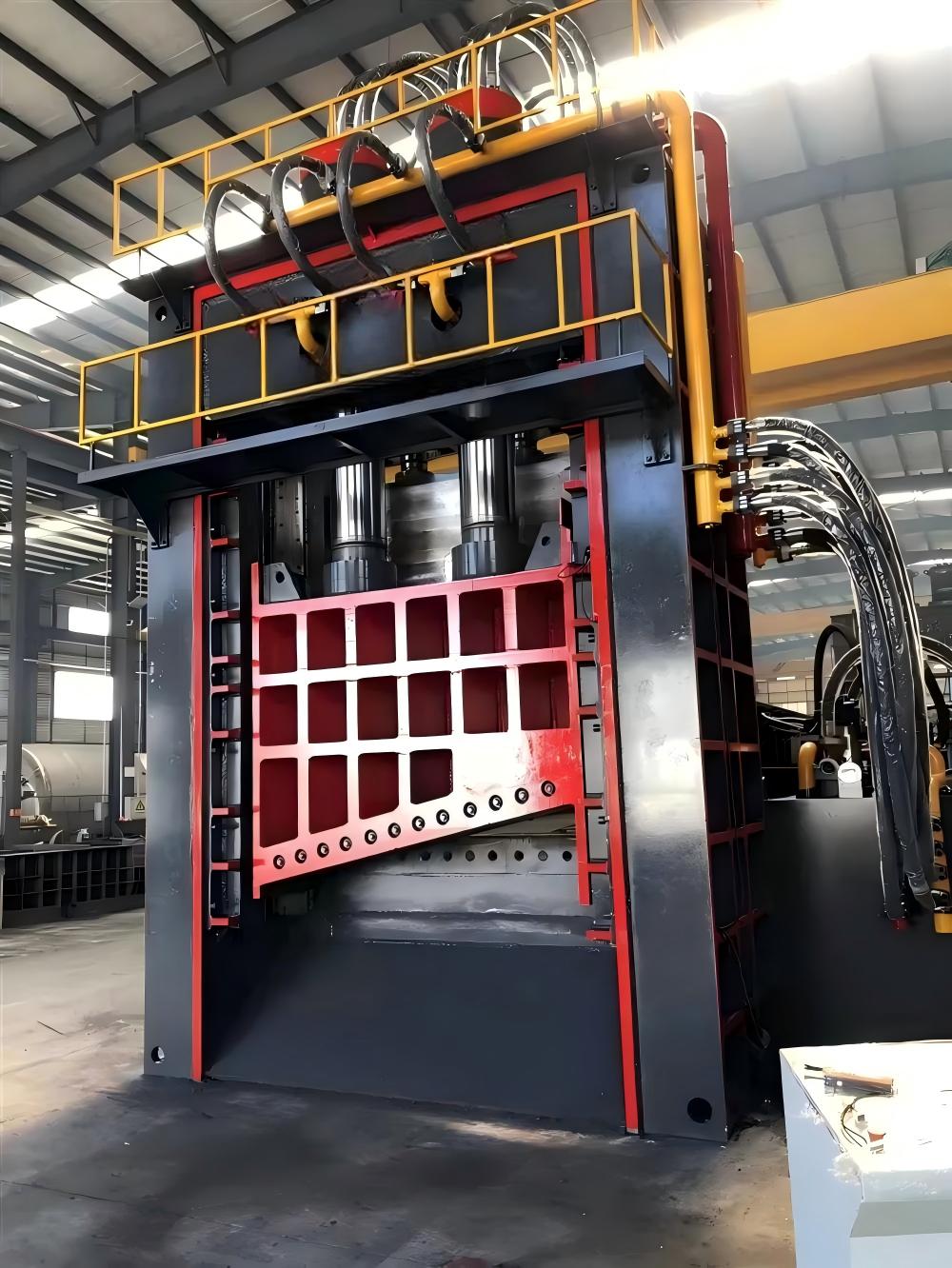 Gantry shear cutting metal scrap in a recycling yard