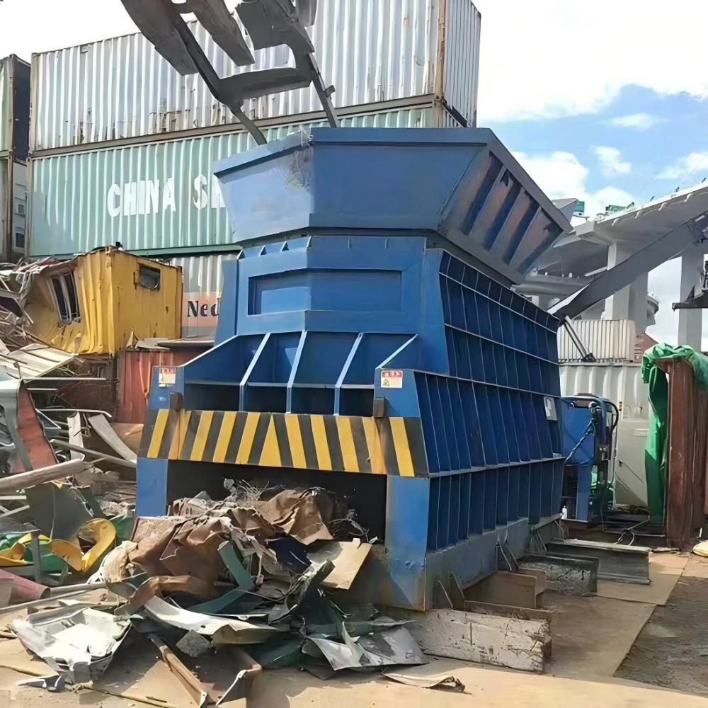 Technician performing maintenance on a container shear